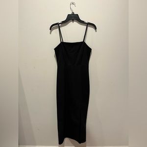 Black Zara dress, size small, has tiny slit on the left side
